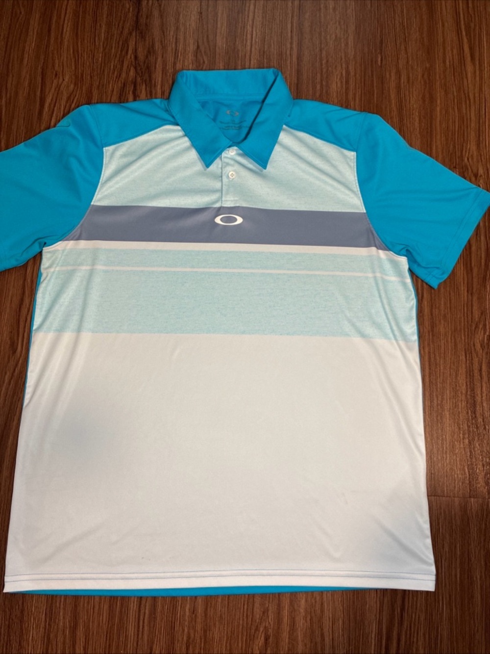 Oakley Teal and Light Blue Striped Performance Polo